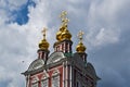 Beautiful building of the Russian Orthodox Church. Covered in gold dome. Crosses and exterior decoration. Love to God Royalty Free Stock Photo