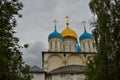 Beautiful building of the Russian Orthodox Church. Covered in gold dome. Crosses and exterior decoration. Love to God Royalty Free Stock Photo