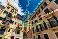 Beautiful buildings of Palma de Mallorca and colorful strips between them