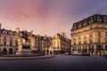 Beautiful buildings place des Victoires, typical parisian facades and windows Royalty Free Stock Photo