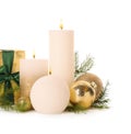 Beautiful burning candles with Christmas decor on white background Royalty Free Stock Photo
