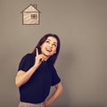 Beautiful business happy woman in black casual t- shirt showing the hand up and pointing the finger above on illustration concept Royalty Free Stock Photo