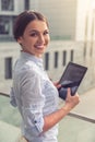 Beautiful business lady with gadget Royalty Free Stock Photo