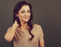 Beautiful business toothy enjoying laughing woman with long brown healthy curly hair style in fashion shirt clothing. Closeup Royalty Free Stock Photo