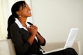 Beautiful business woman on black suit and smiling