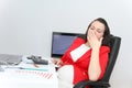 Beautiful business woman dreaming while working on computer at her office Royalty Free Stock Photo