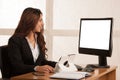 Beautiful business woman in her office with blank space on her m Royalty Free Stock Photo