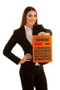 Beautiful business woman holds a large calculator isolated over Royalty Free Stock Photo