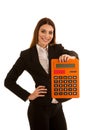 Beautiful business woman holds a large calculator isolated over Royalty Free Stock Photo