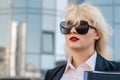 Beautiful business woman near office building. Portrait of successful business woman Royalty Free Stock Photo