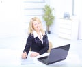 Beautiful business woman working on her laptop Royalty Free Stock Photo