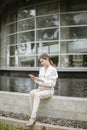 Beautiful business woman is working outside office Royalty Free Stock Photo