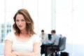 Beautiful businesswoman in front of her teamwork Royalty Free Stock Photo