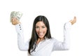 Beautiful businesswoman holding Dollar notes