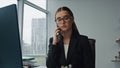 Beautiful businesswoman making call in business center. Focused assistant work Royalty Free Stock Photo