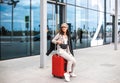 Beautiful businesswoman against the backdrop of the airport.