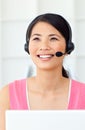 Beautiful Businesswoman talking on headset Royalty Free Stock Photo