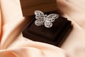 Beautiful butterfly shaped gold diamond ring or brooch Royalty Free Stock Photo