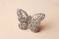 Beautiful butterfly shaped gold diamond ring or brooch Royalty Free Stock Photo