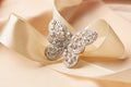 Beautiful butterfly shaped gold diamond ring or brooch Royalty Free Stock Photo