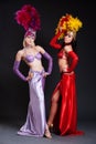 Beautiful cabaret women in bright costumes