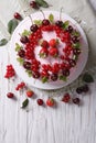 Beautiful cake with fresh berries vertical top view Royalty Free Stock Photo