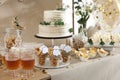 Beautiful cake and other treats on table. Baby shower party Royalty Free Stock Photo