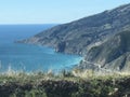 Beautiful California Drive at Big Sur California with mountain, ocean and blue sky Royalty Free Stock Photo