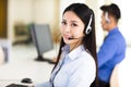 Beautiful call center agent working in office Royalty Free Stock Photo