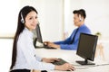 Beautiful call center agent working in office Royalty Free Stock Photo