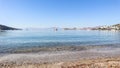 Beautiful calm blue bay with sand beach in Mediterranean. Holiday and relaxation on sea coast Royalty Free Stock Photo