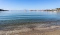 Beautiful calm blue bay with sand beach in Mediterranean. Holiday and relaxation on sea coast Royalty Free Stock Photo