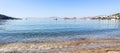 Beautiful calm blue bay with sand beach in Mediterranean. Holiday and relaxation on sea coast Royalty Free Stock Photo