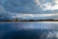 Beautiful calm blue lake, afternoon clouds on the sky Royalty Free Stock Photo