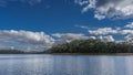 Beautiful calm lake. Ripples on the blue water. Royalty Free Stock Photo