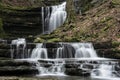 Beautiful calm landscape image of Scaleber Force waterfall in Yorkshire Dales in England during Winter morning