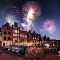 Beautiful calm night view of Amsterdam city. Colorful fireworks Royalty Free Stock Photo