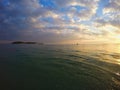 Beautiful calm orange ocean and sky sunrise