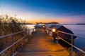 Beautiful calm sea at sunset seen from a wooden dock in Ostprignitz-Ruppin district, Germany Royalty Free Stock Photo