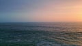 Beautiful calm seascape twilight aerial view. Ocean waving under evening sky Royalty Free Stock Photo