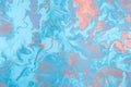 Beautiful calming background in oily blue and orange pastel colors