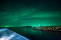 Beautiful calmness starry night sky with seashore pier