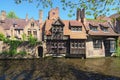 Beautiful canal and old, traditional houses in the town of Bruges dutch: Brugge, Belgium. Spring landscape photo Royalty Free Stock Photo