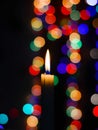 Beautiful candle light scene with blur colorful light