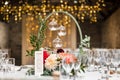 Beautiful candle light wedding table decor with flowers at wedding Royalty Free Stock Photo