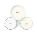 Beautiful candles with wooden wicks on white background, top view Royalty Free Stock Photo