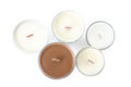 Beautiful candles with wooden wicks on white background, top view Royalty Free Stock Photo