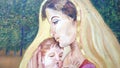 A canvas painting of a mother and son. Royalty Free Stock Photo