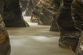 Waterfall surrounded by rocks