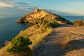 Beautiful Cape Kapchik in the Black Sea illuminated rising sun. Crimea. Royalty Free Stock Photo